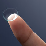 An IOL lense on a finger